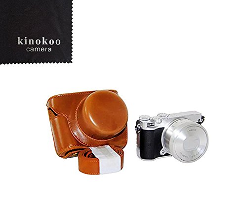 kinokoo Nikon ミラーレス一眼 Nikon1 J5 (レンズ範囲： NIKKOR VR、10-30mm f/3.5-5.6付属) カメラケース カメラバッグ PUレザー 人工革 軽量 おしゃれ PUレザー 全面保護型 三脚穴付き ショルダーストラップ付き (ブラウン)